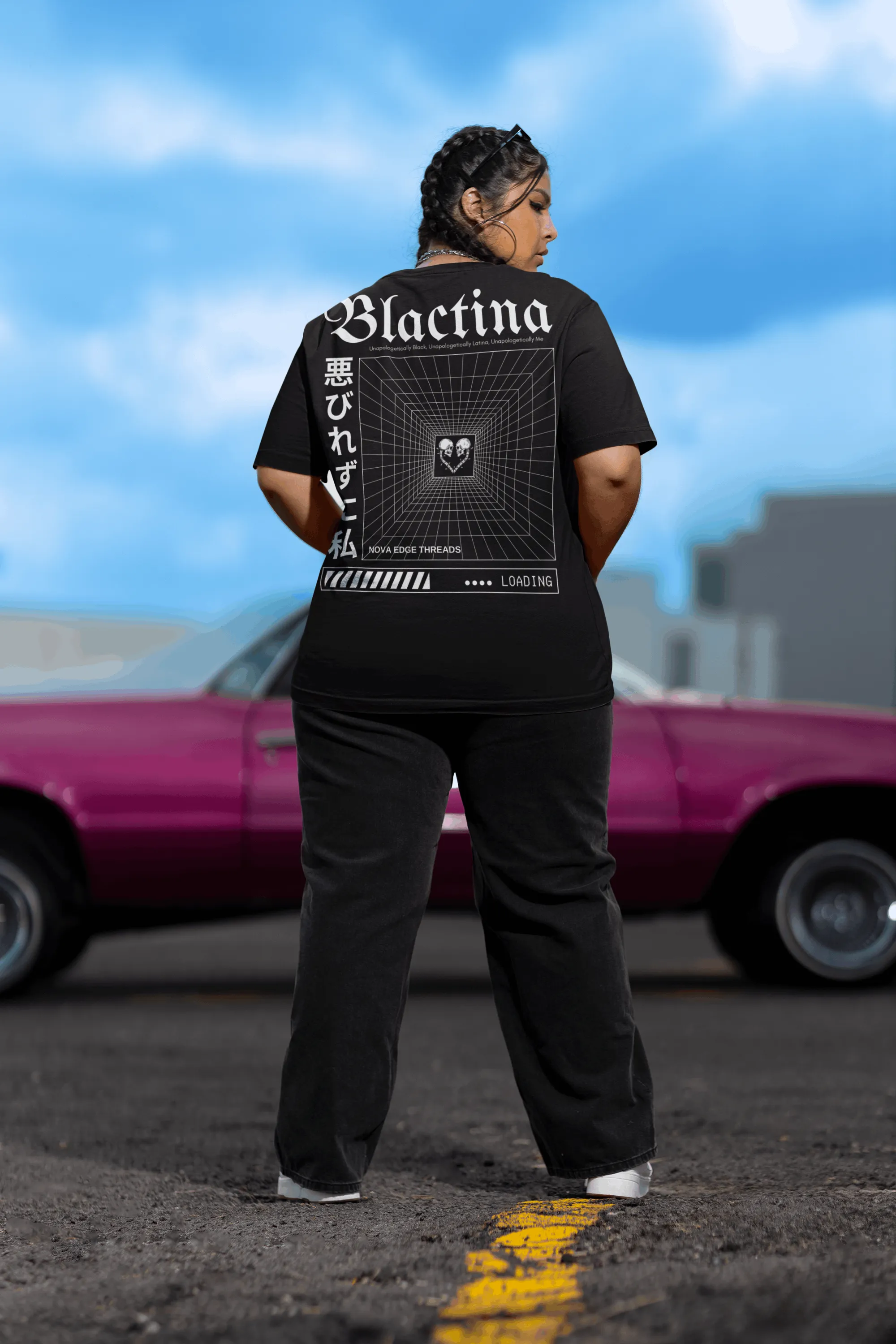 Blactina Graphic T-Shirt Black and Latina Pride on back of Black Oversize Deep Drop Shoulder Tee