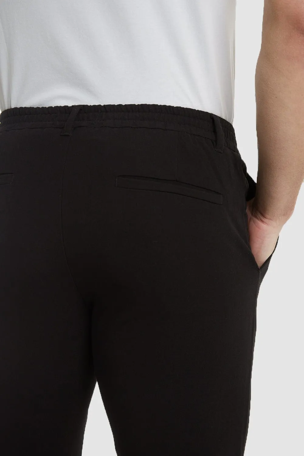 Cropped Pleated Trousers in Black