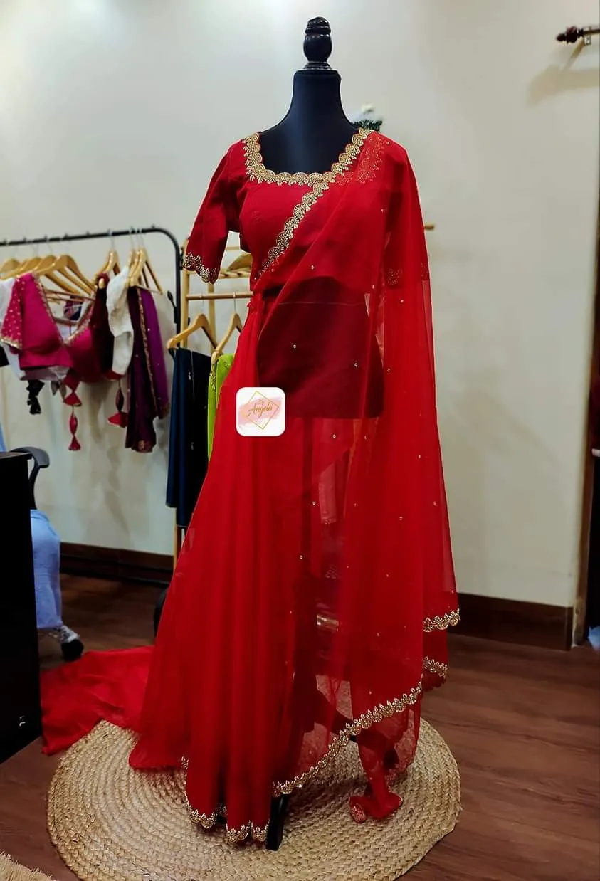 Organza saree with scallop embroidery borders paired with scallop neckline blouse- Blood Red